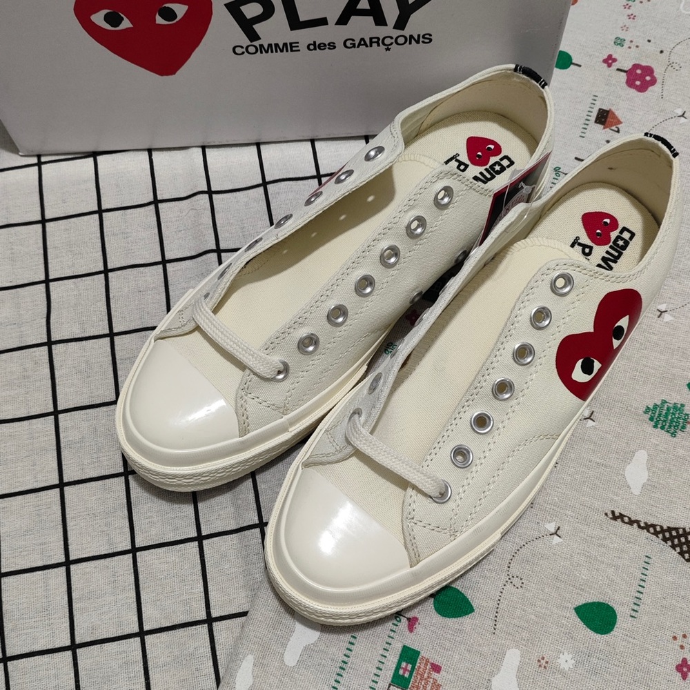 Comme des Garçons PLAY Cream Slip-On Sneakers with Red Heart Logo